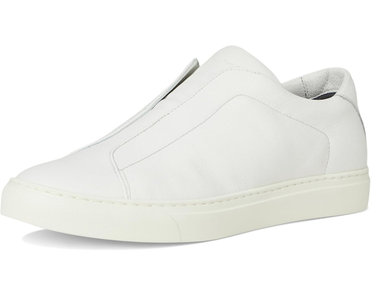 White low-top slip-on sneakers, front three-quarter view with rubber sole
