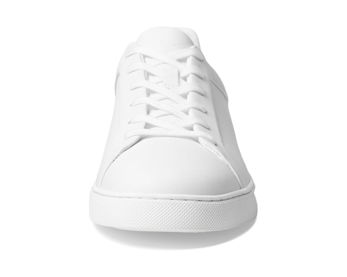 White lace-up low-top sneakers with round toe and padded tongue