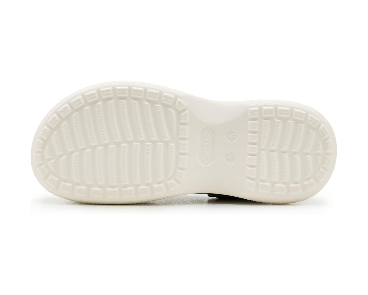 Outsole view of unisex platform clog sneaker with textured white tread