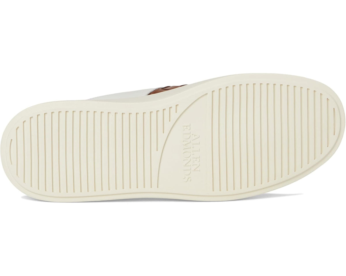 Light cream rubber outsole with ridged tread pattern