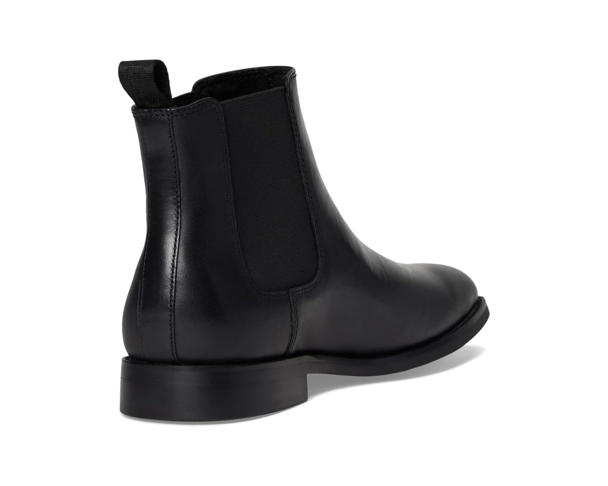 Black leather Chelsea boots with elastic gore and low stacked heel