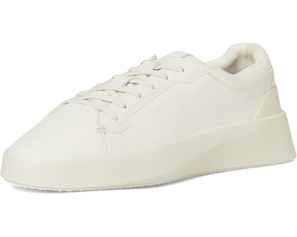 Off-white unisex low-top lace-up sneaker in profile with thick sole