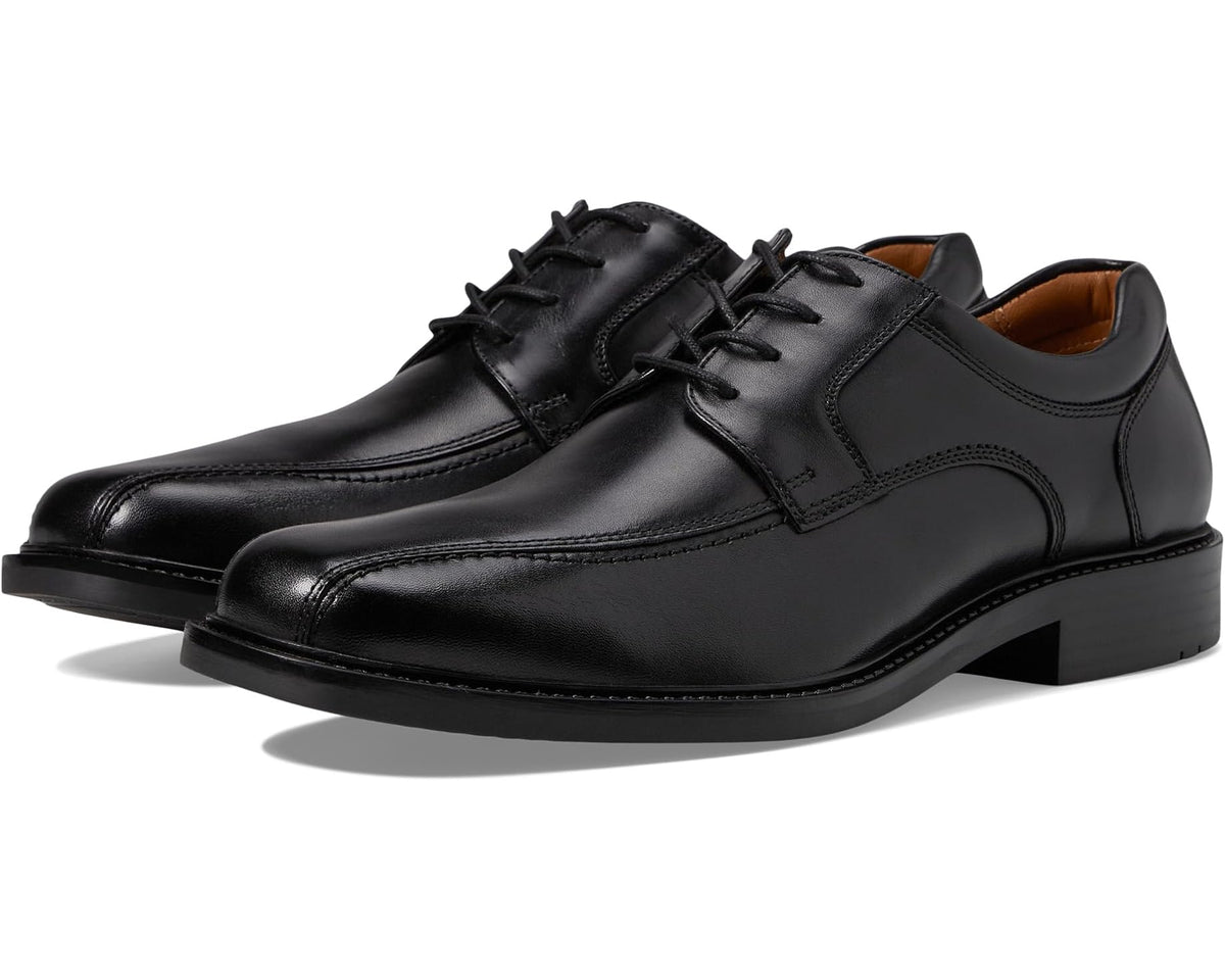 Black leather lace-up dress shoe with rounded toe and padded collar