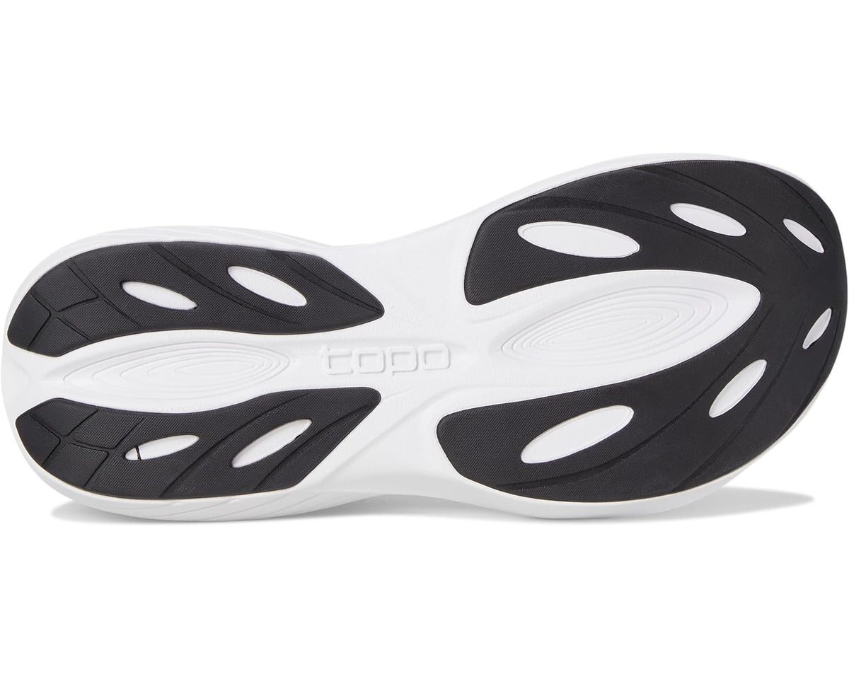 Men's running shoe outsole with black traction pods on white tread