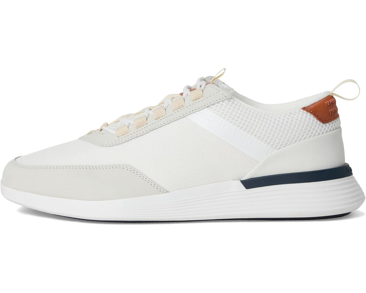 White low-top lace-up sneaker with mesh side panel and navy-accented midsole