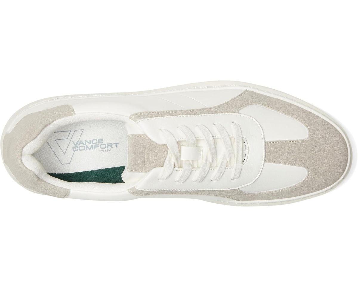 Men's low-top sneaker outsole with tread, white upper and beige accents