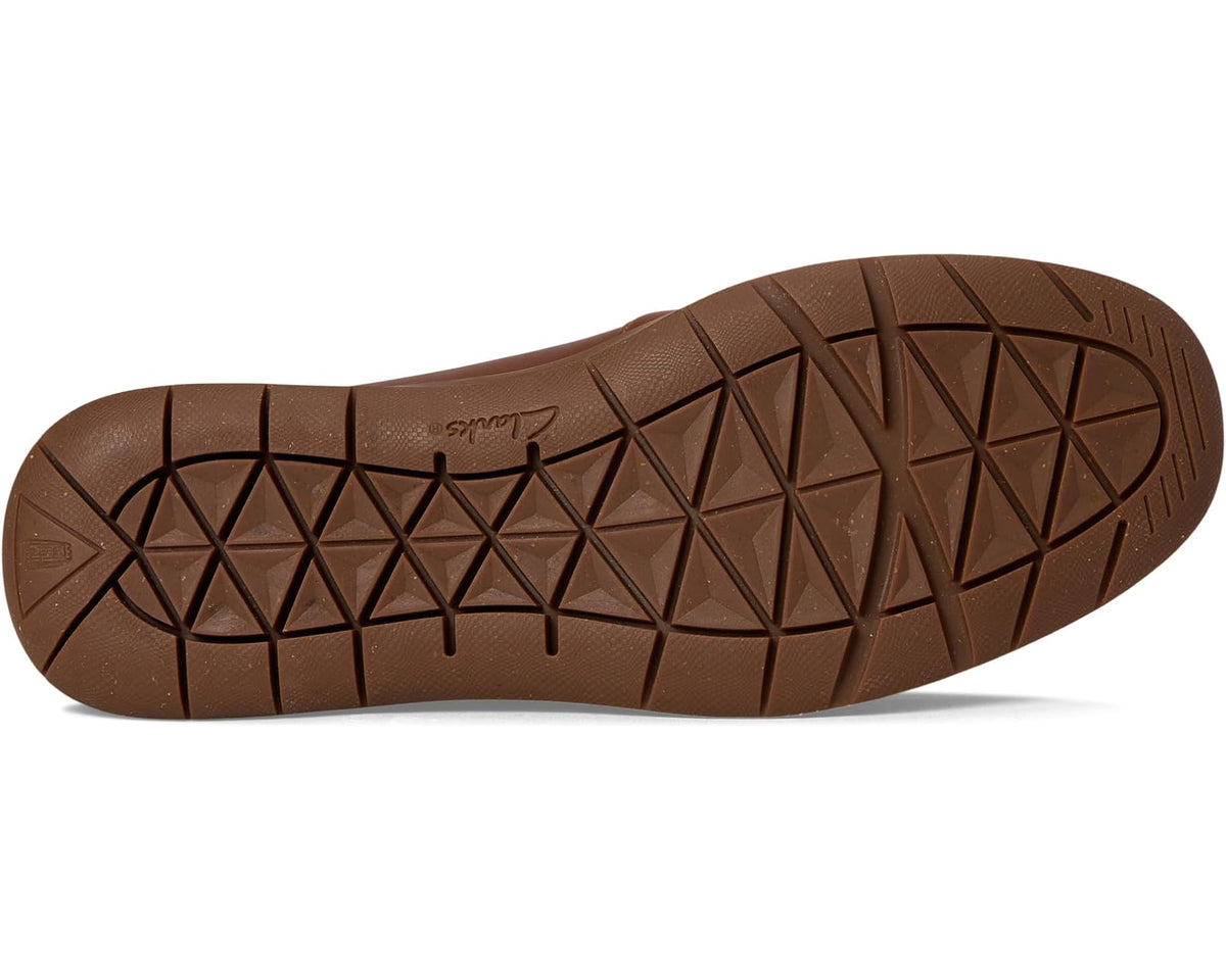 Men's tan rubber outsole with geometric tread pattern