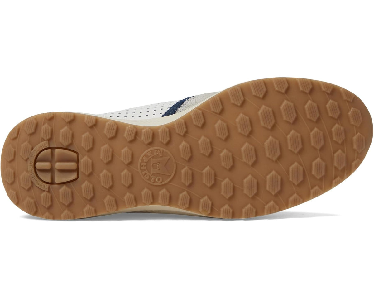 Men's sneaker outsole with tan rubber tread and brand emblem at heel