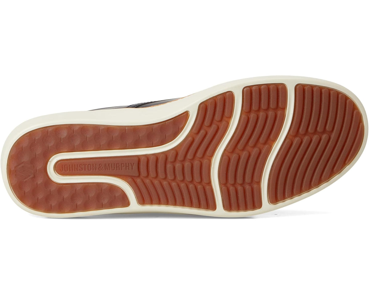 Men's dark navy oxford outsole with textured rubber tread and cream sidewall