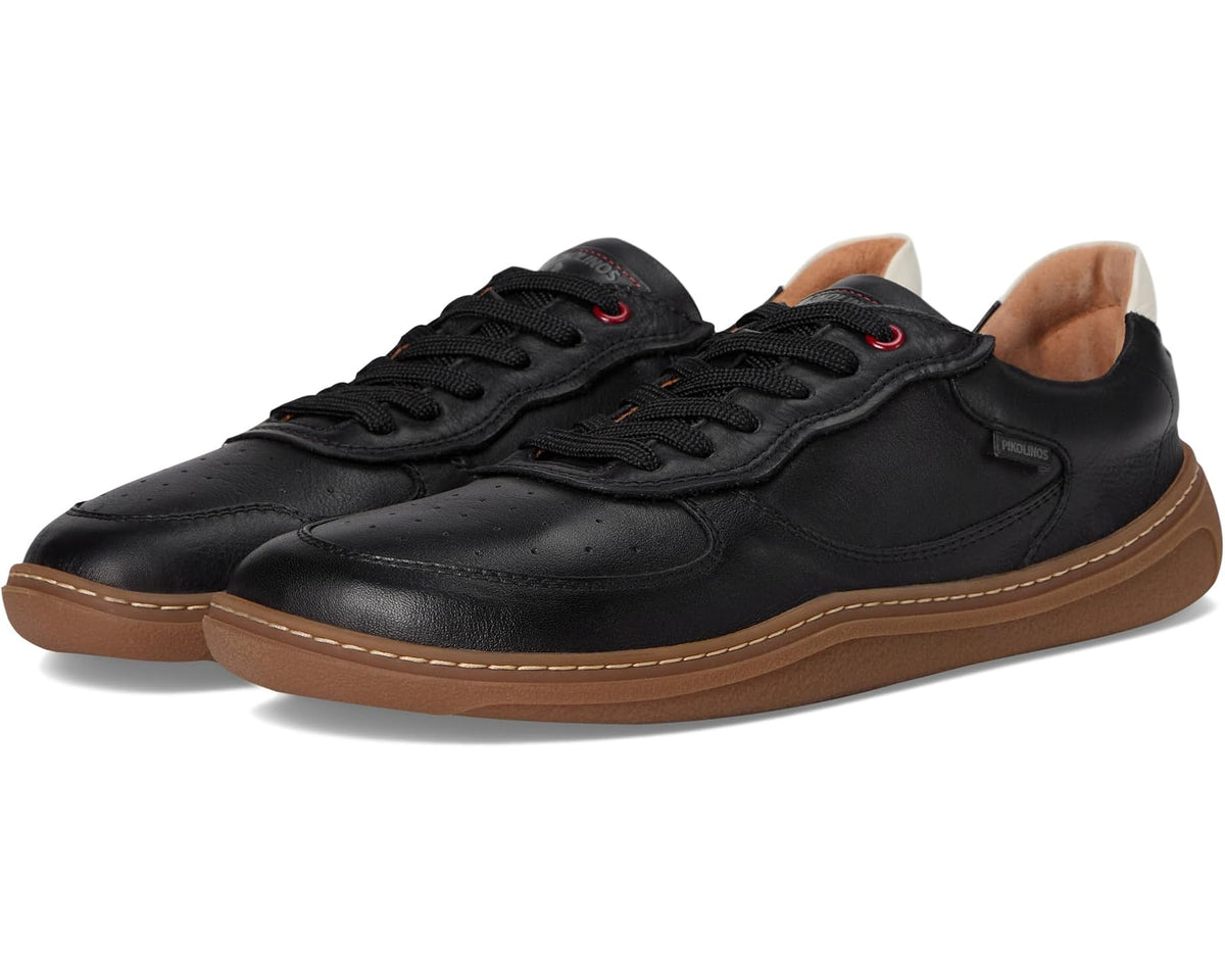 Black unisex PIKOLINOS lace-up sneakers with tan rubber sole