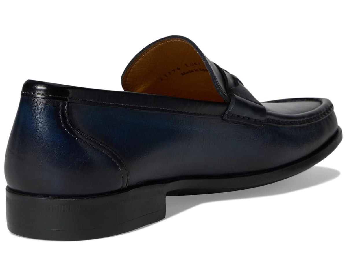 Navy leather loafer heel and sole with tan interior lining