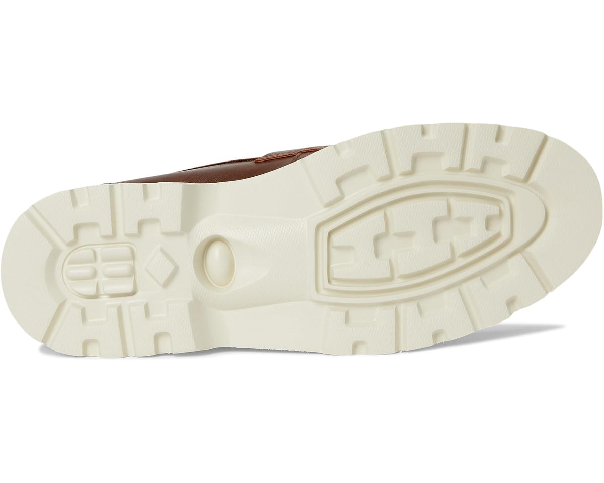 Brown loafer outsole with white tread pattern and chunky sole edge