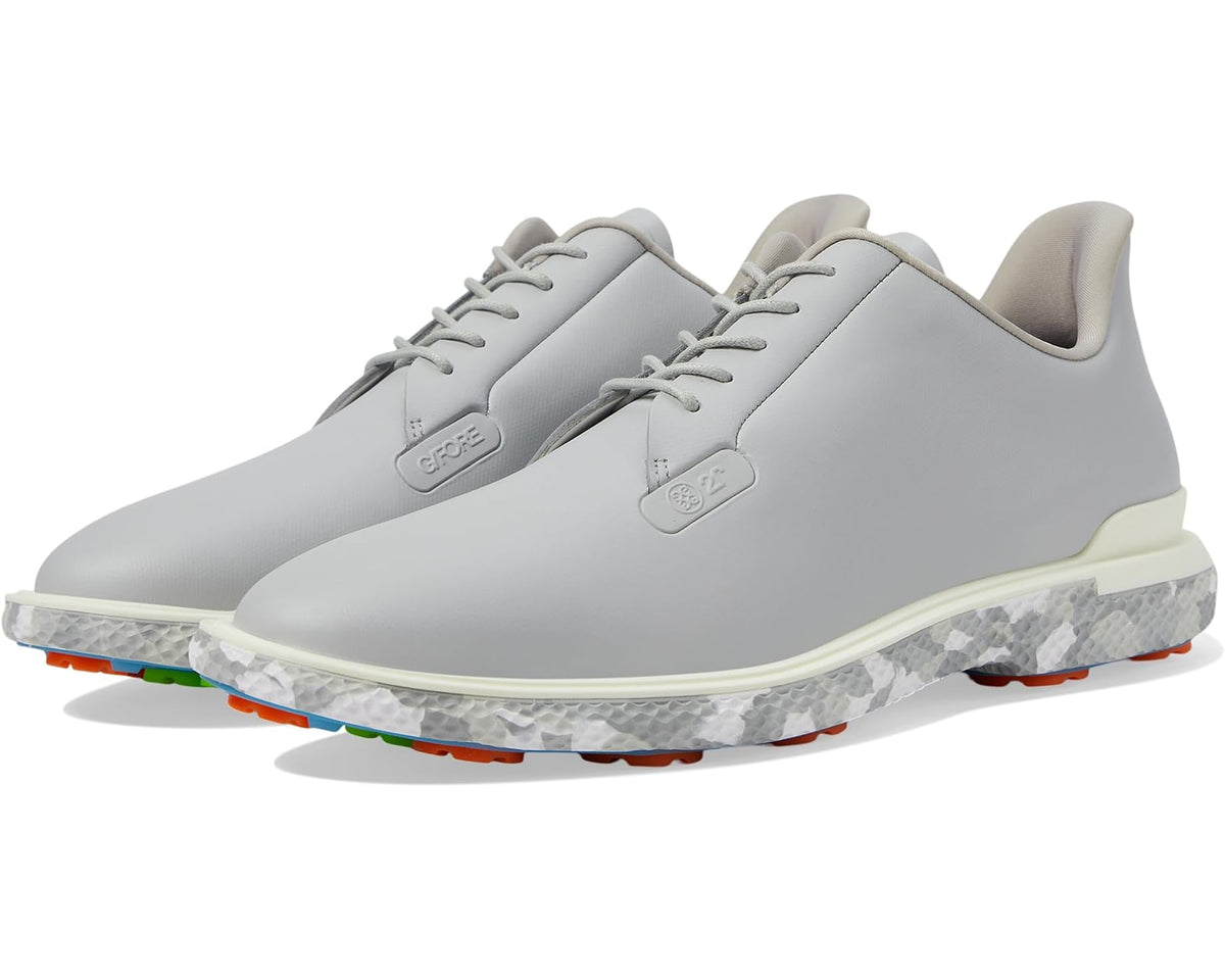 Men's light gray golf shoes with lace-up front and cushioned collar