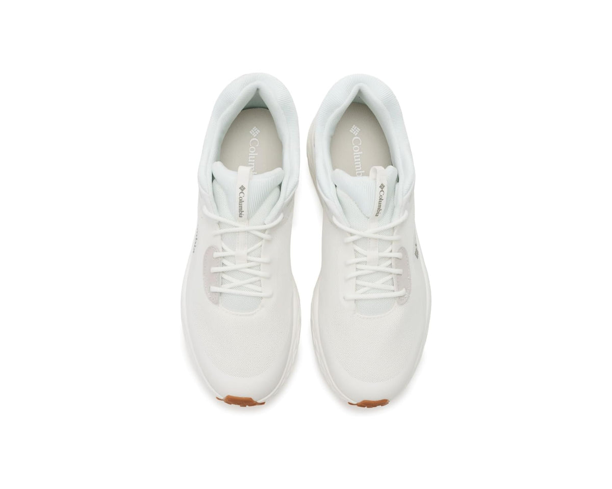 White lace-up sneakers viewed from above with green heel lining