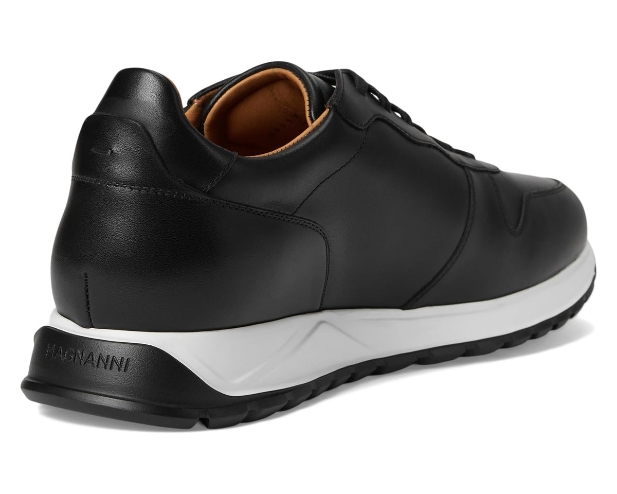Black leather sneaker heel with white sole and Magnanni logo stamp
