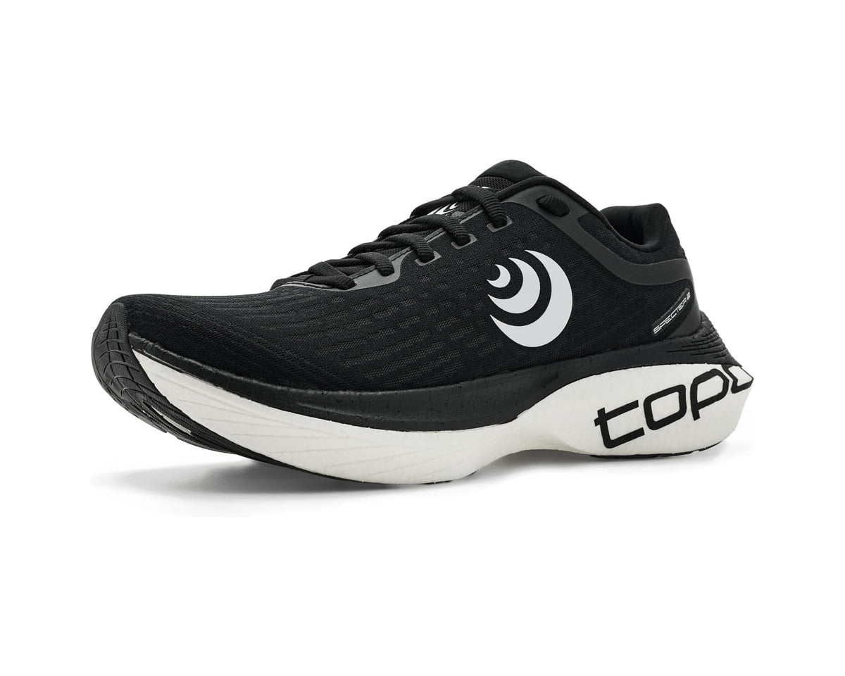 Black and white men’s running shoe with lace-up front, C logo, and white sole.