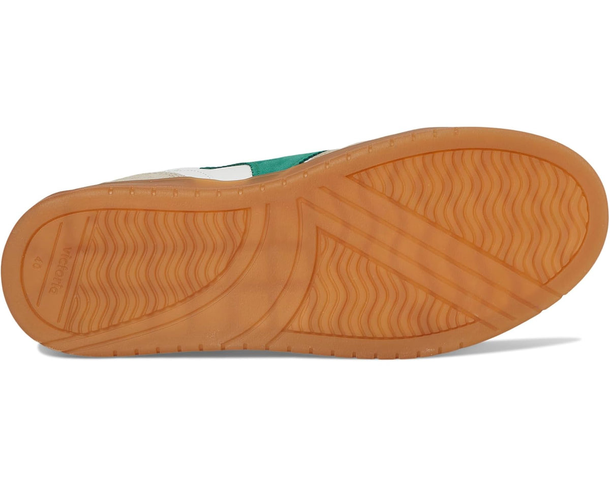 Outsole view: thick caramel rubber traction sole for low-top sneakers