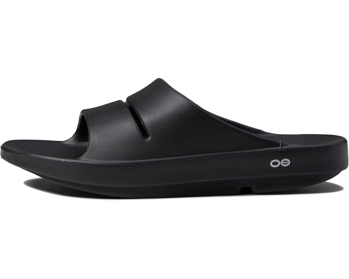 Black OOahh slide sandal side profile with contoured midsole and open toe strap