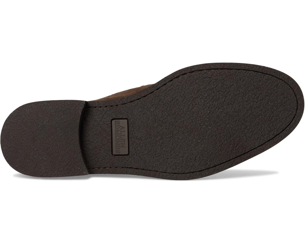 Suede loafer outsole and heel, dark brown with logo patch on the sole