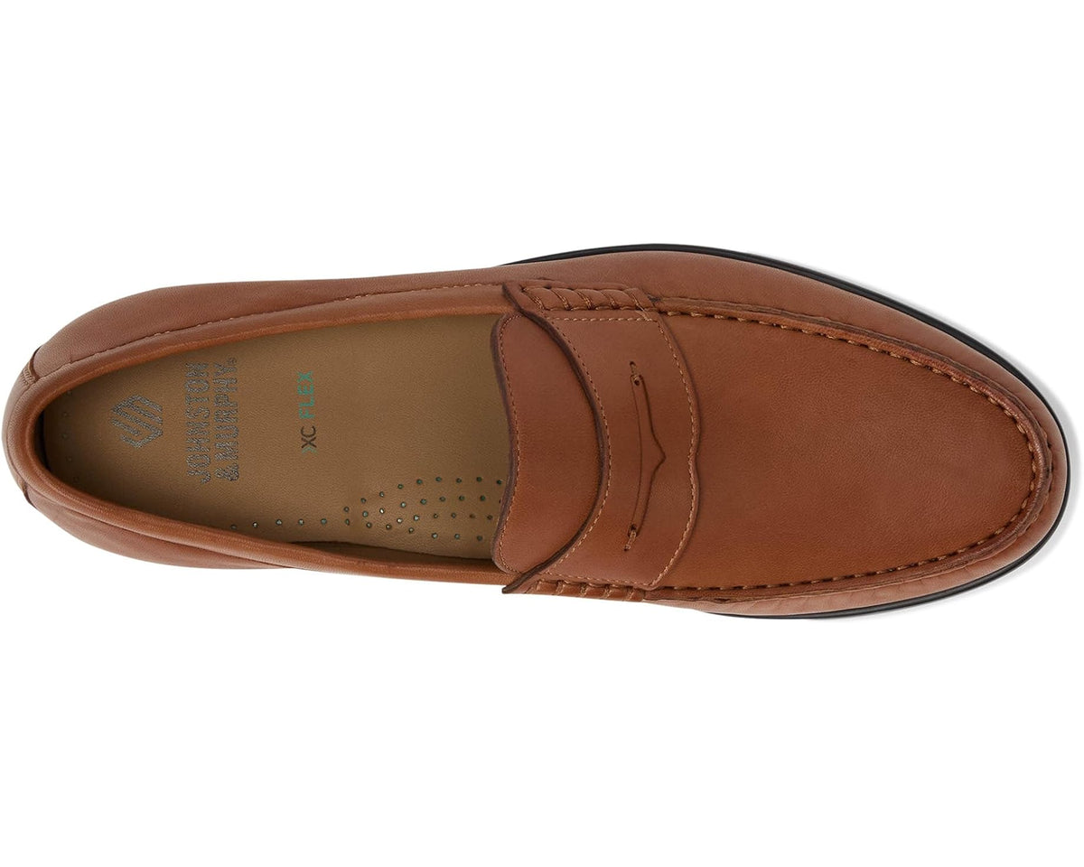Cognac leather penny loafer side view with stitched apron and cushioned insole