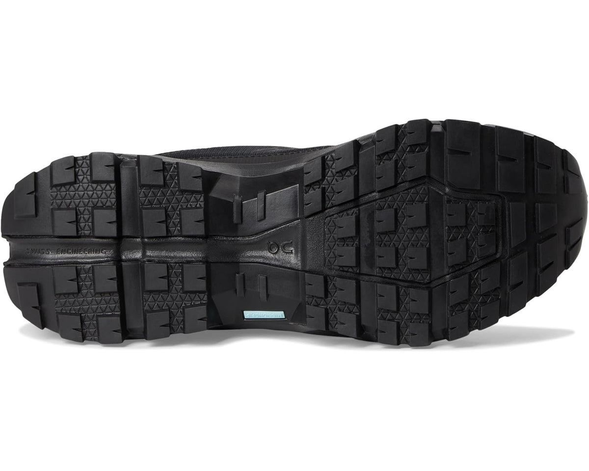 Men's black waterproof trail shoe outsole with deep tread and traction lugs