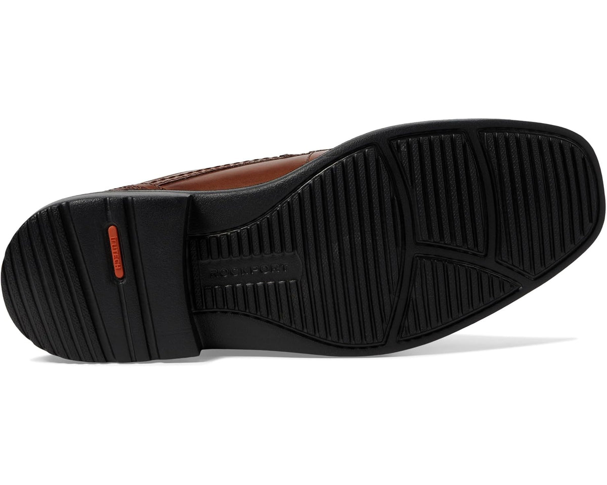 Men's Rockport oxford shoes, tan leather, black rubber outsole with orange heel detail