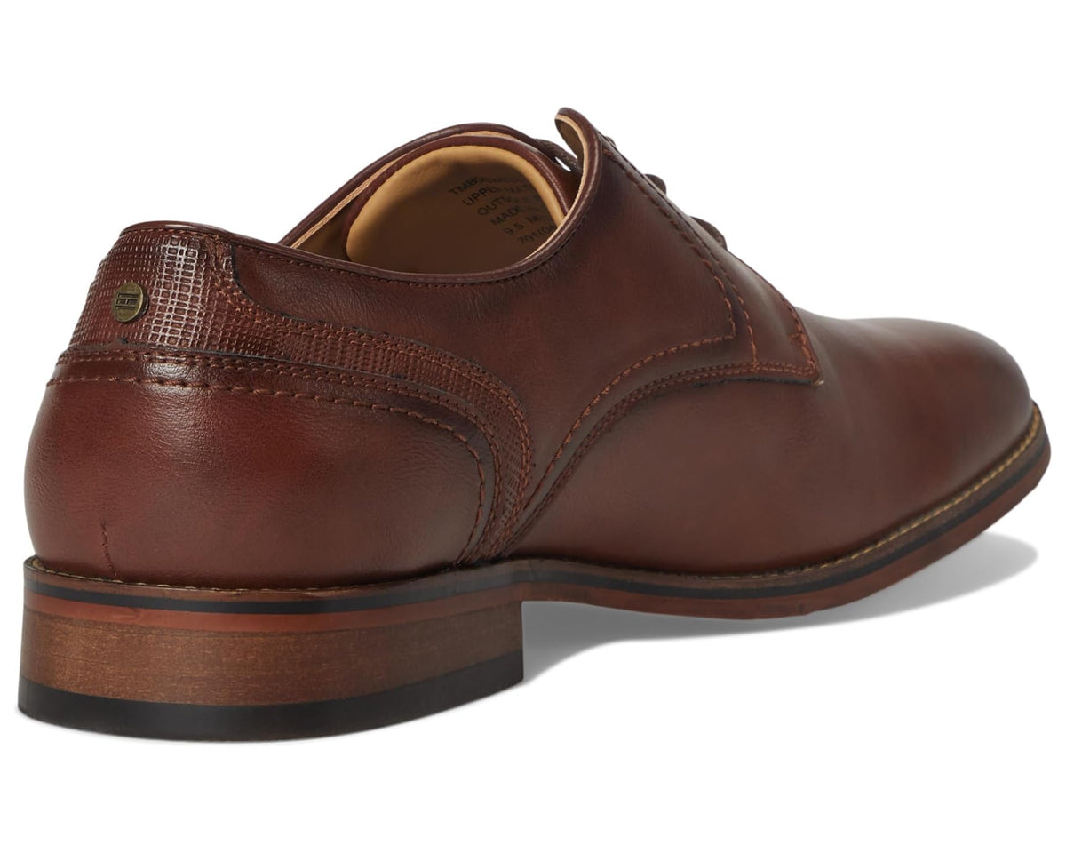 Men's medium brown leather oxford shoes, heel and rear side view with trim stitching