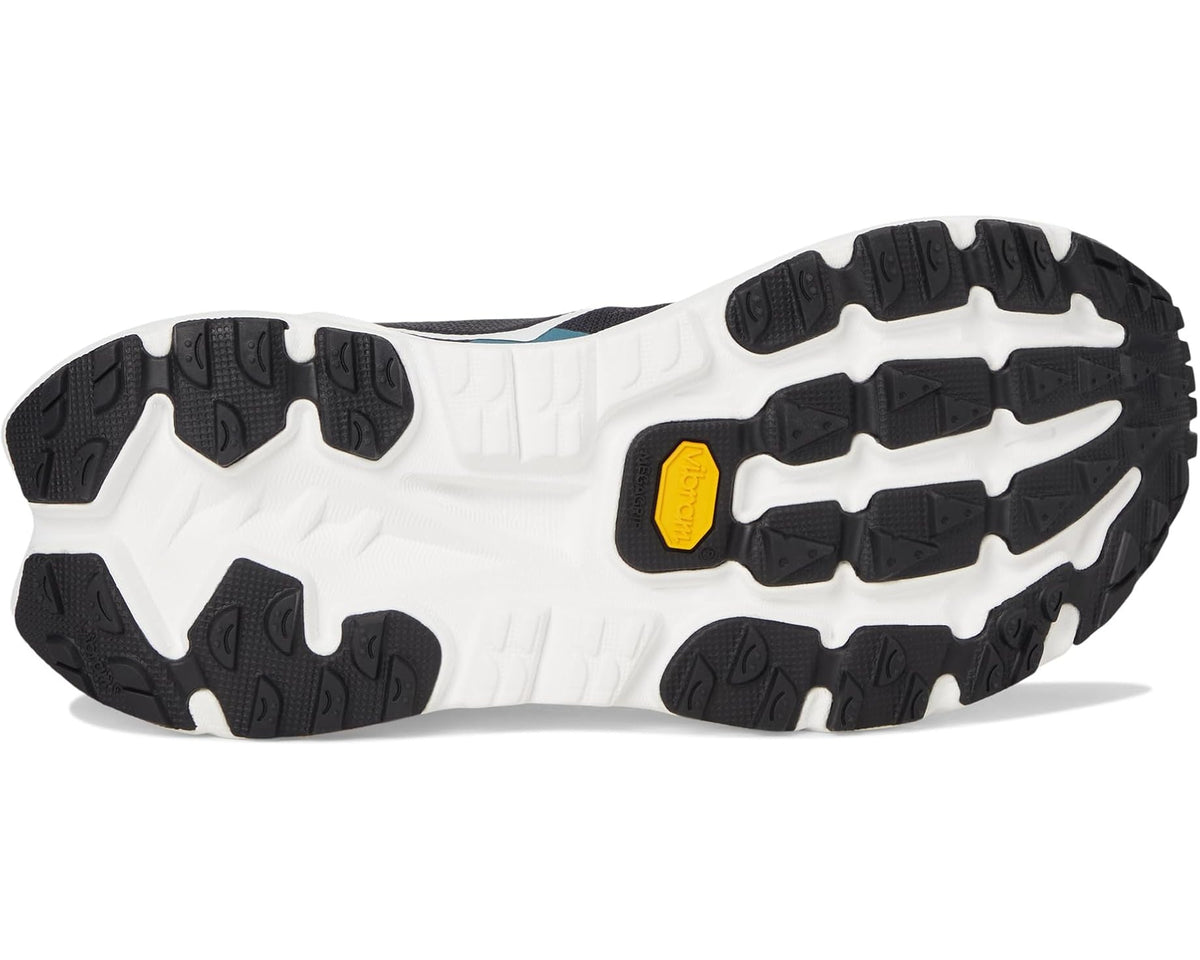 Men's Hoka Mafate X shoe outsole, black tread with white base and yellow Vibram badge