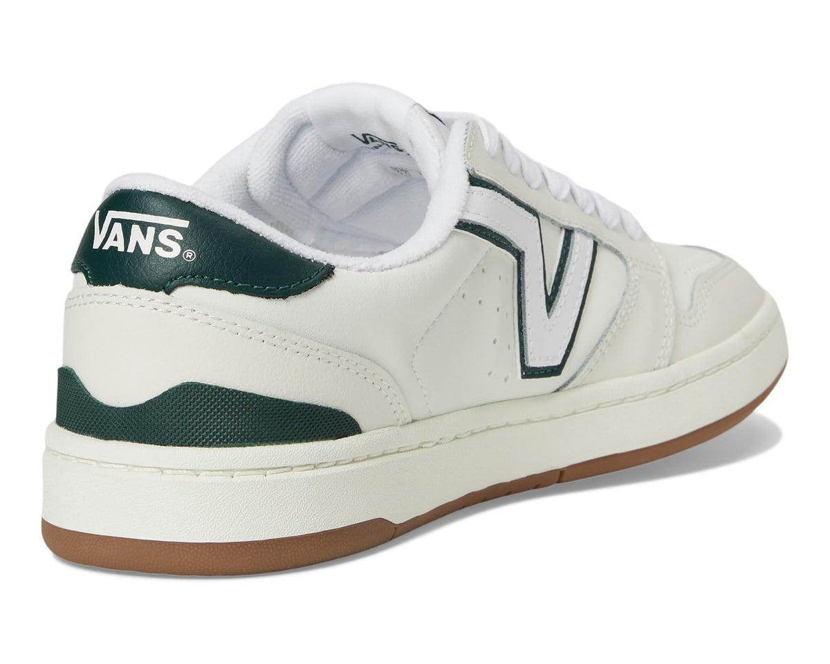 Vans unisex low-top sneakers with dark green heel panel, white laces, and padded collar.