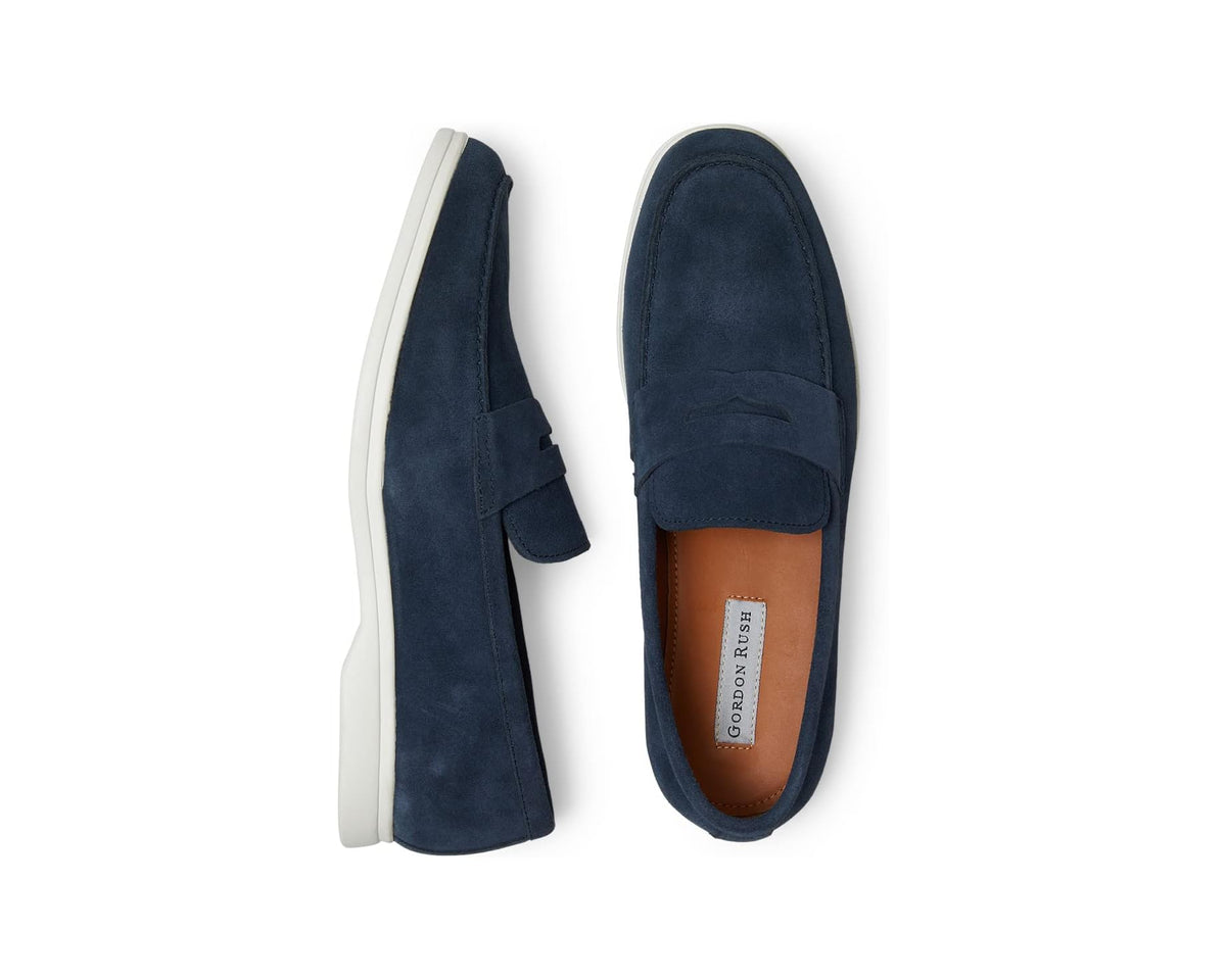 Navy suede men’s slip-on loafer shoes with cushioned collar and white rubber sole