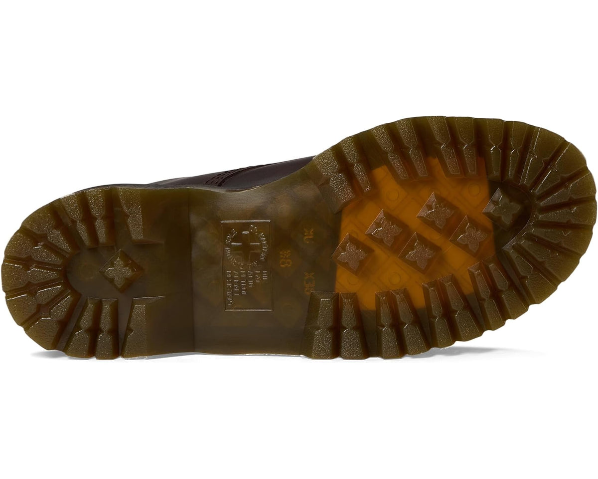 Dark brown platform boot outsole with textured tread and grip lugs.