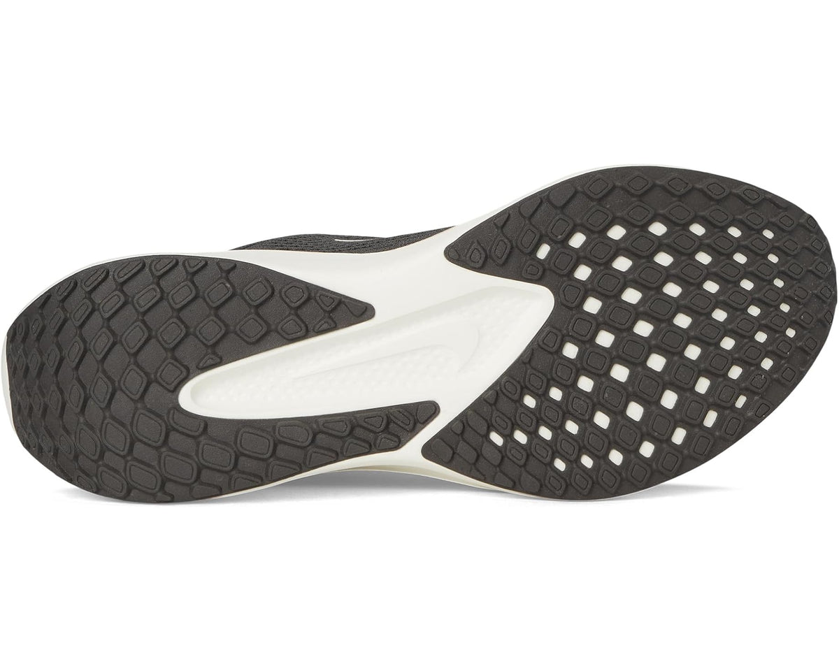 Men's black running shoe outsole with textured tread and off-white midfoot.