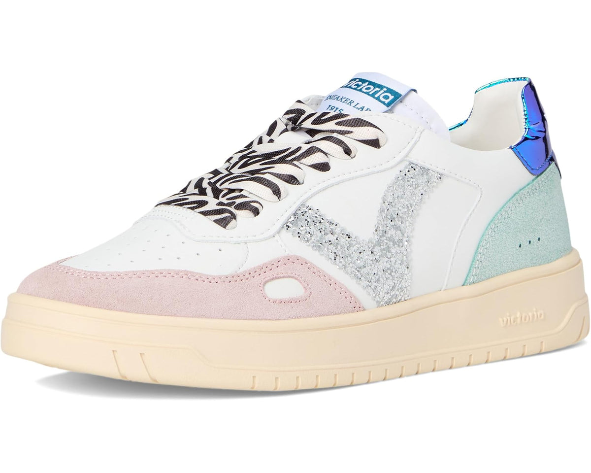 Unisex suede sneakers front view with zebra laces, glitter triangle, and pastel accents