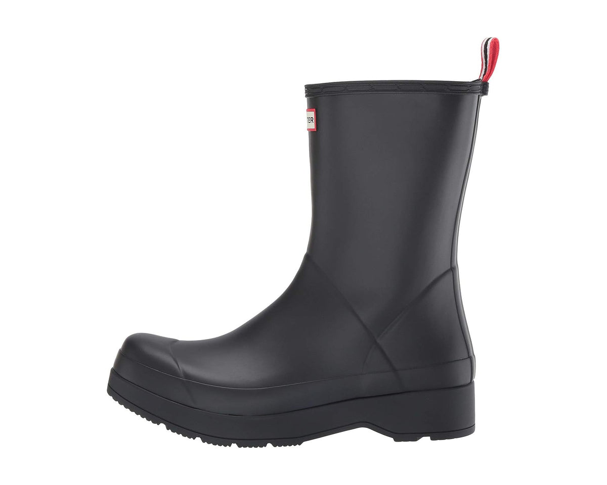 Black mid-height rubber boot with side panel seam and ribbed edge opening