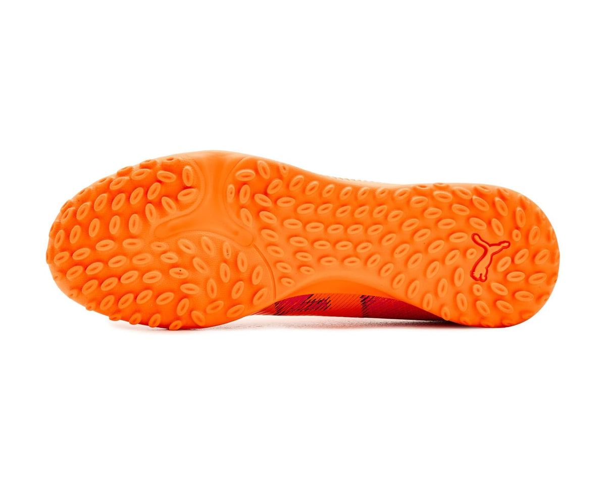 Orange rubber turf outsole for PUMA soccer cleats with round traction studs