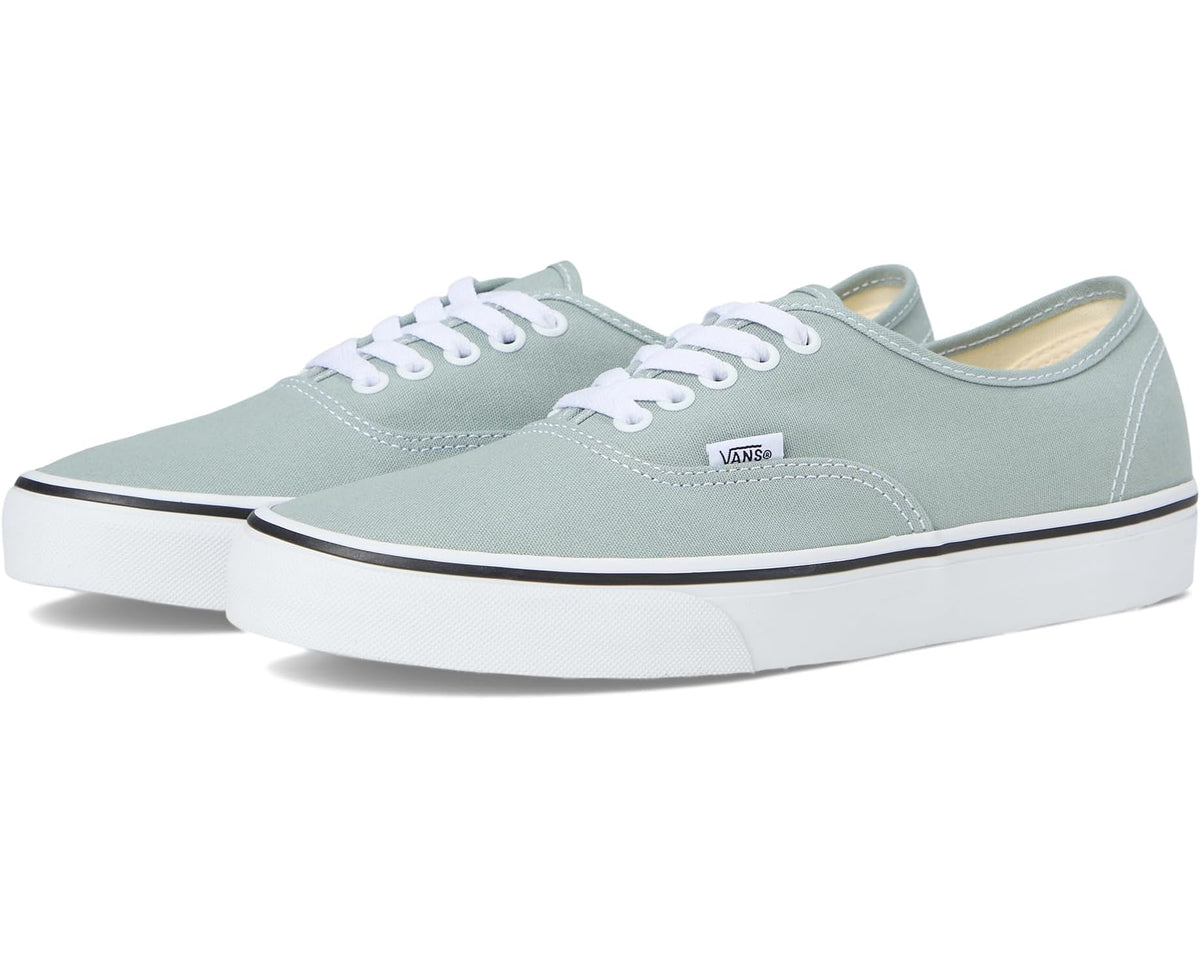 Unisex low-top Vans sneakers in light gray canvas with lace-up front and white sole