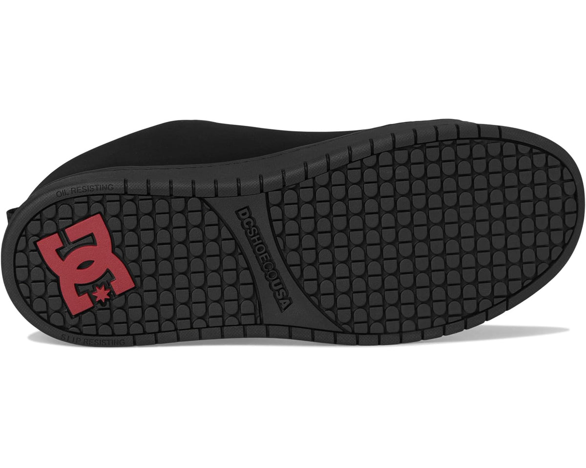 Men's black work sneaker outsole with textured tread and DC logo