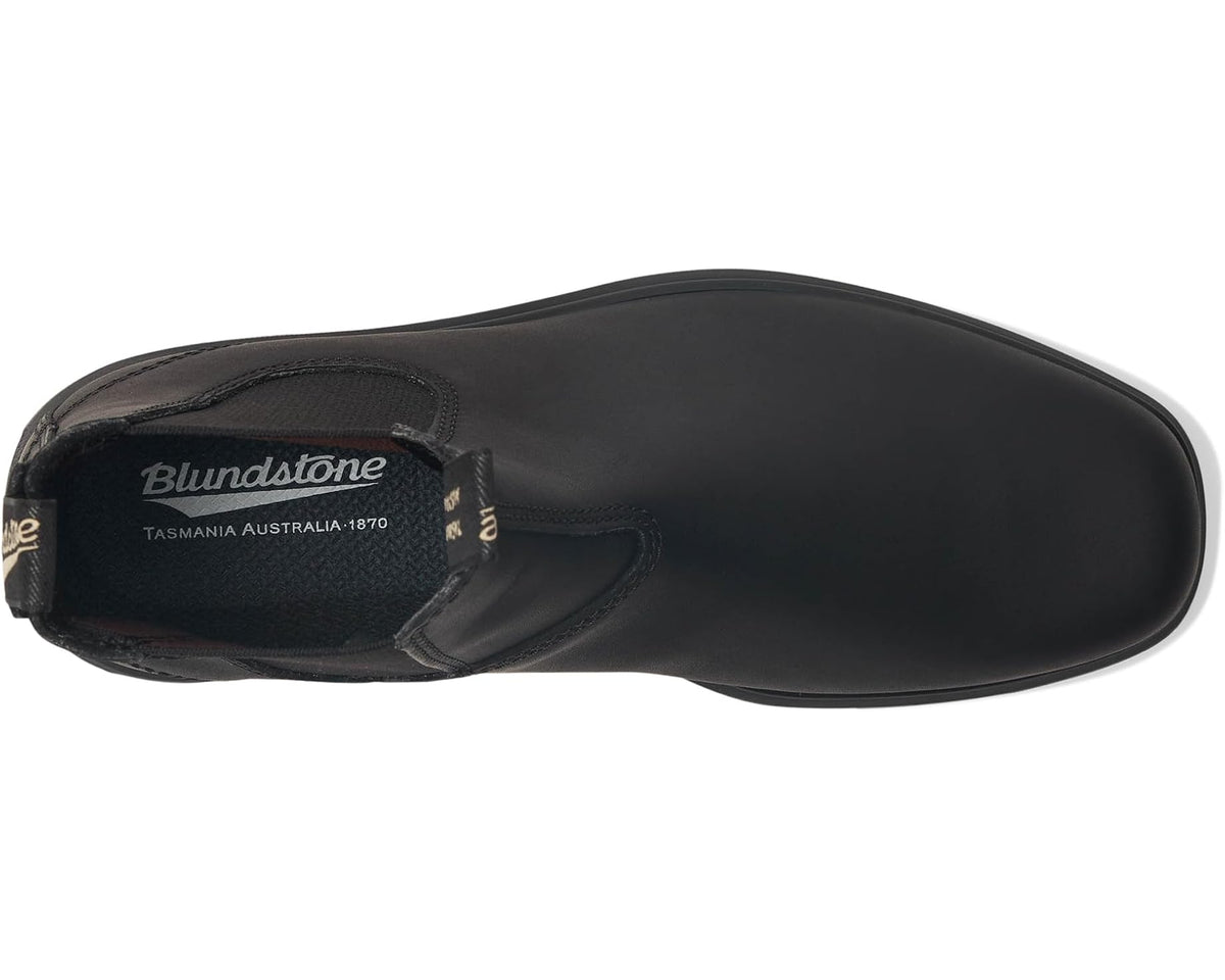 Black Chelsea boot with stitched upper, round toe, and Blundstone logo on lining