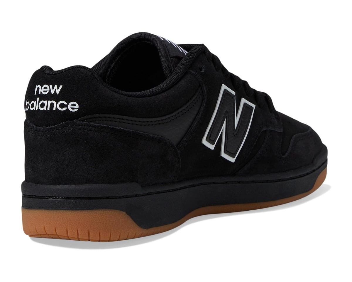 Black New Balance 480 sneaker heel with new balance branding and gum sole