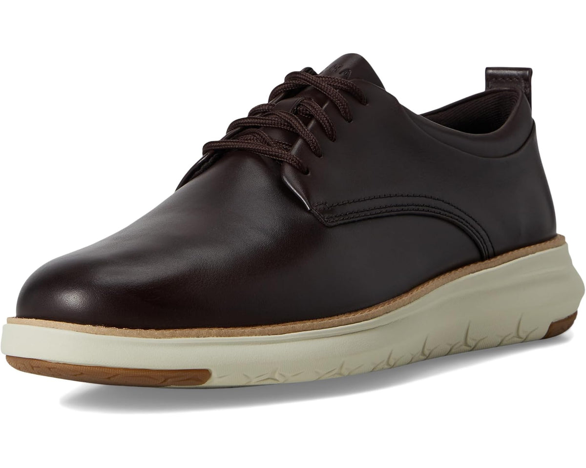 Men's dark brown oxford shoes with round toe, lace-up, and cream-toned outsole