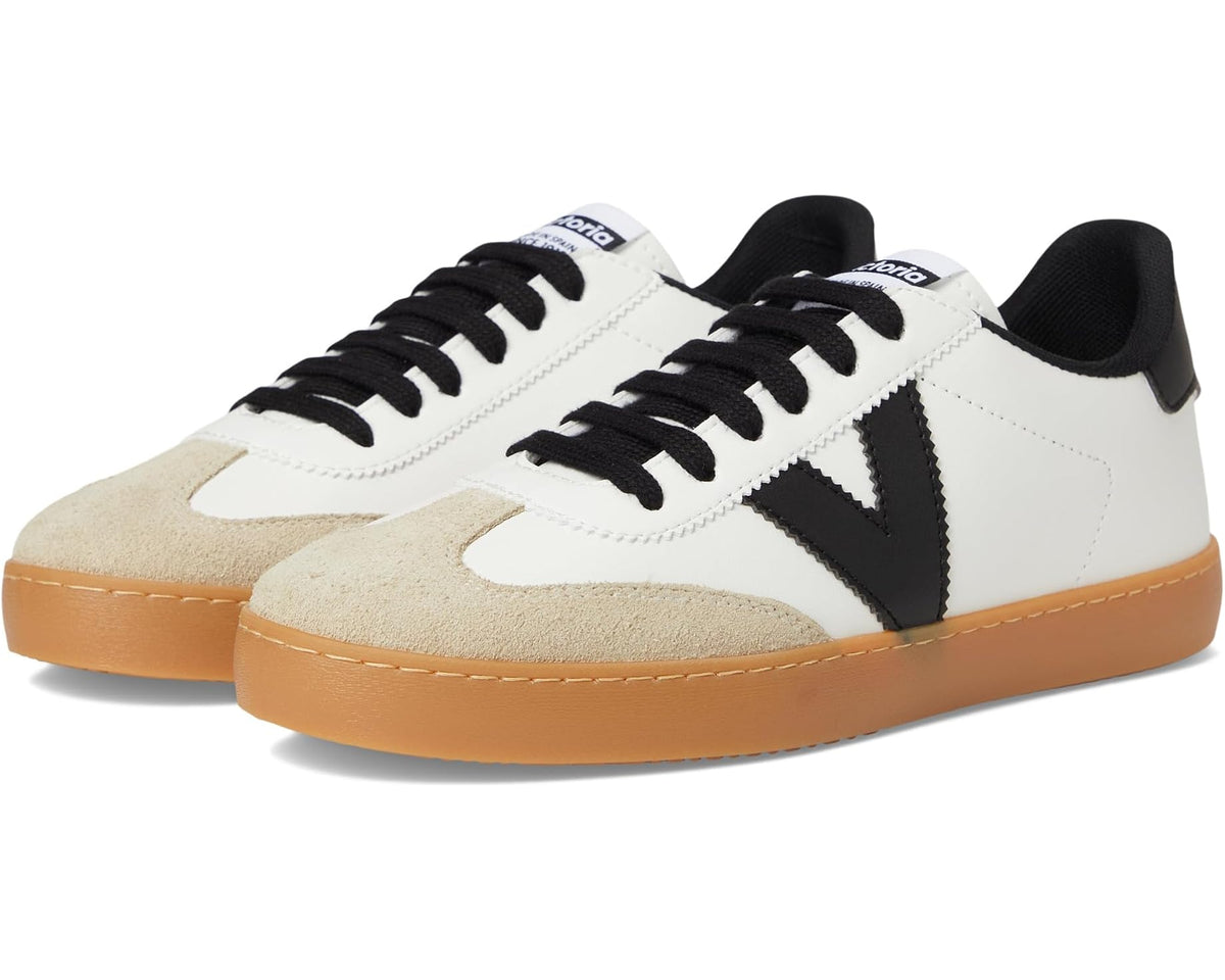 Unisex low-top sneakers with white upper, black logo, beige suede accents, tan gum sole