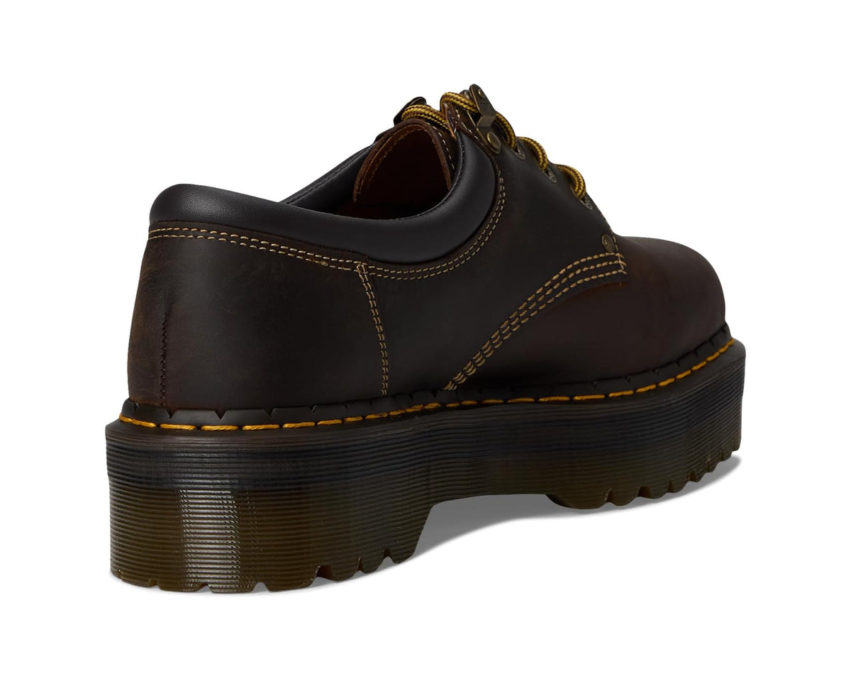 Dark brown leather lace-up shoe heel view with cushioned collar and platform sole