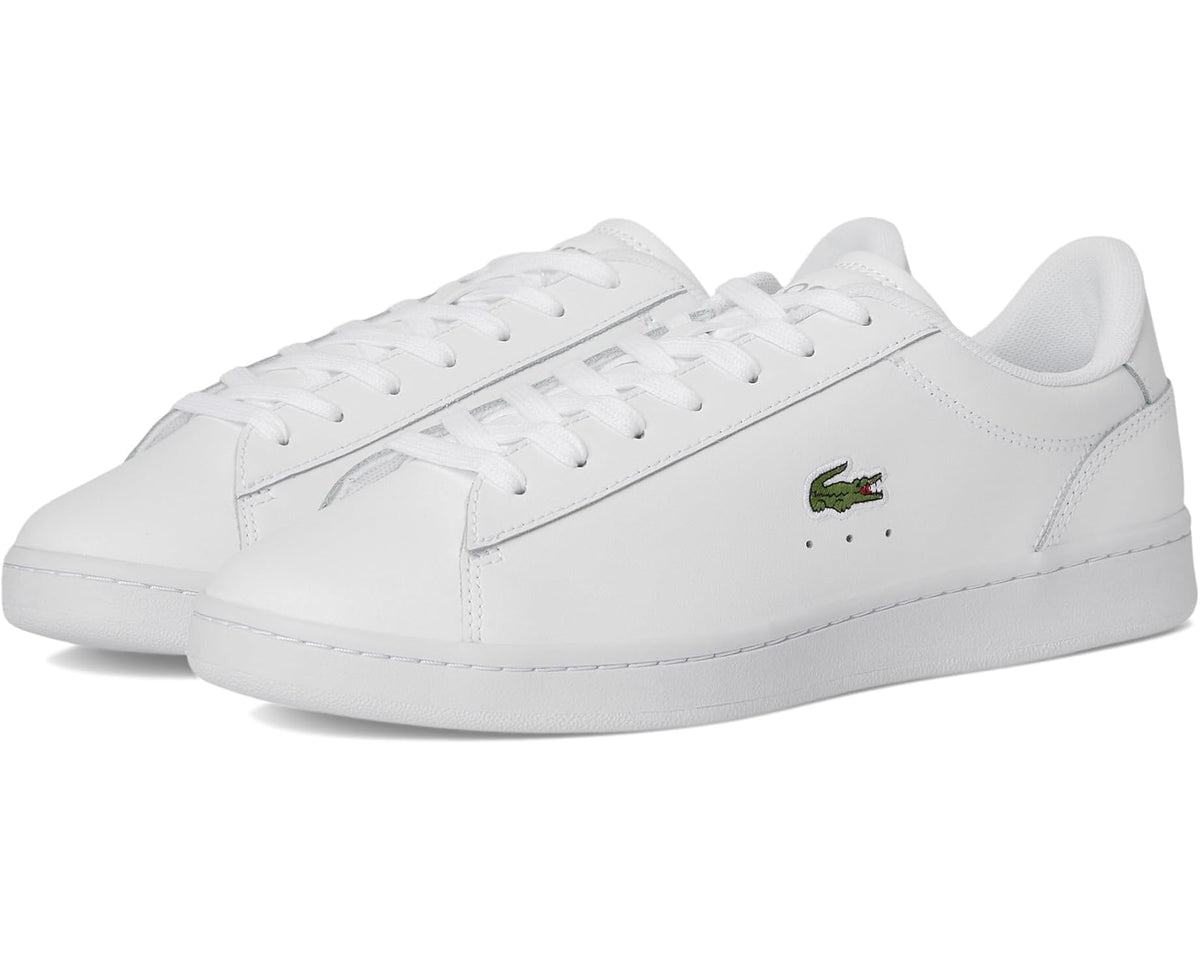 White Lacoste Carnaby leather trainers with green crocodile logo and lace-up front