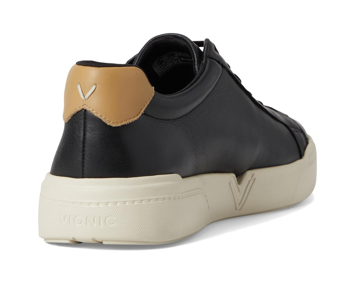 Black leather sneaker heel with tan collar panel and off-white midsole