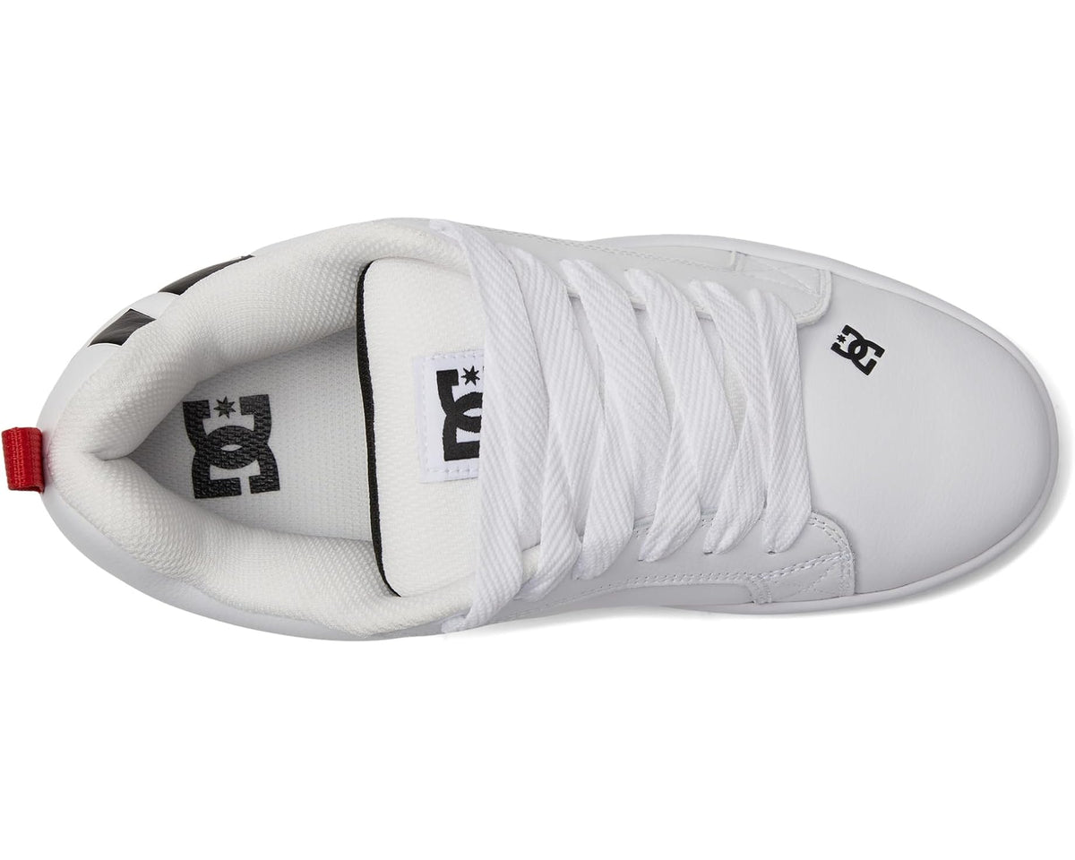 White low-top sneakers with lace-up front, black logo on tongue and side panel