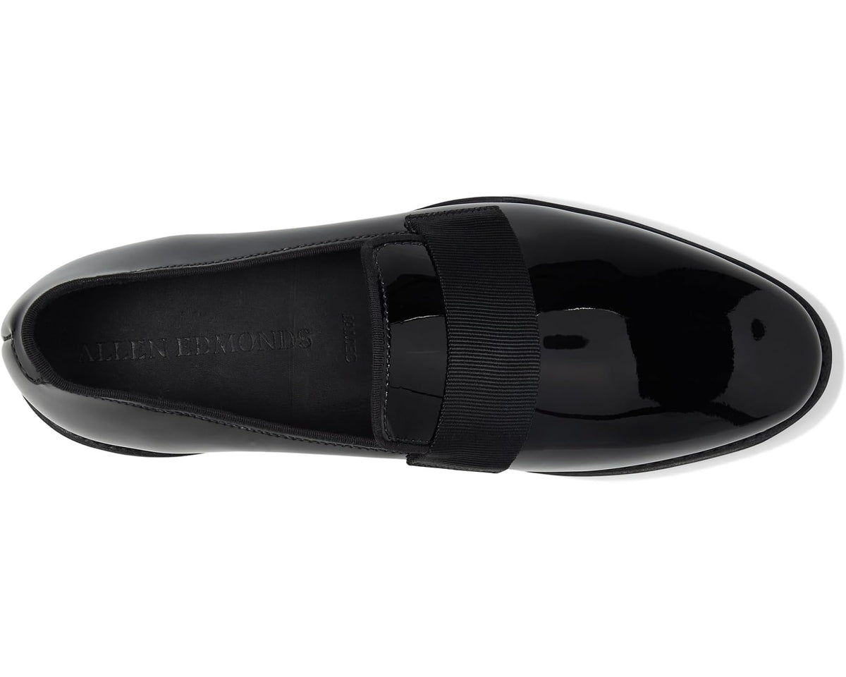 Black patent leather loafer top view with wide strap over vamp