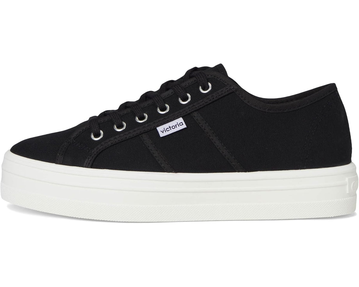 Black canvas low-top sneakers with lace-up front and side panel stitching