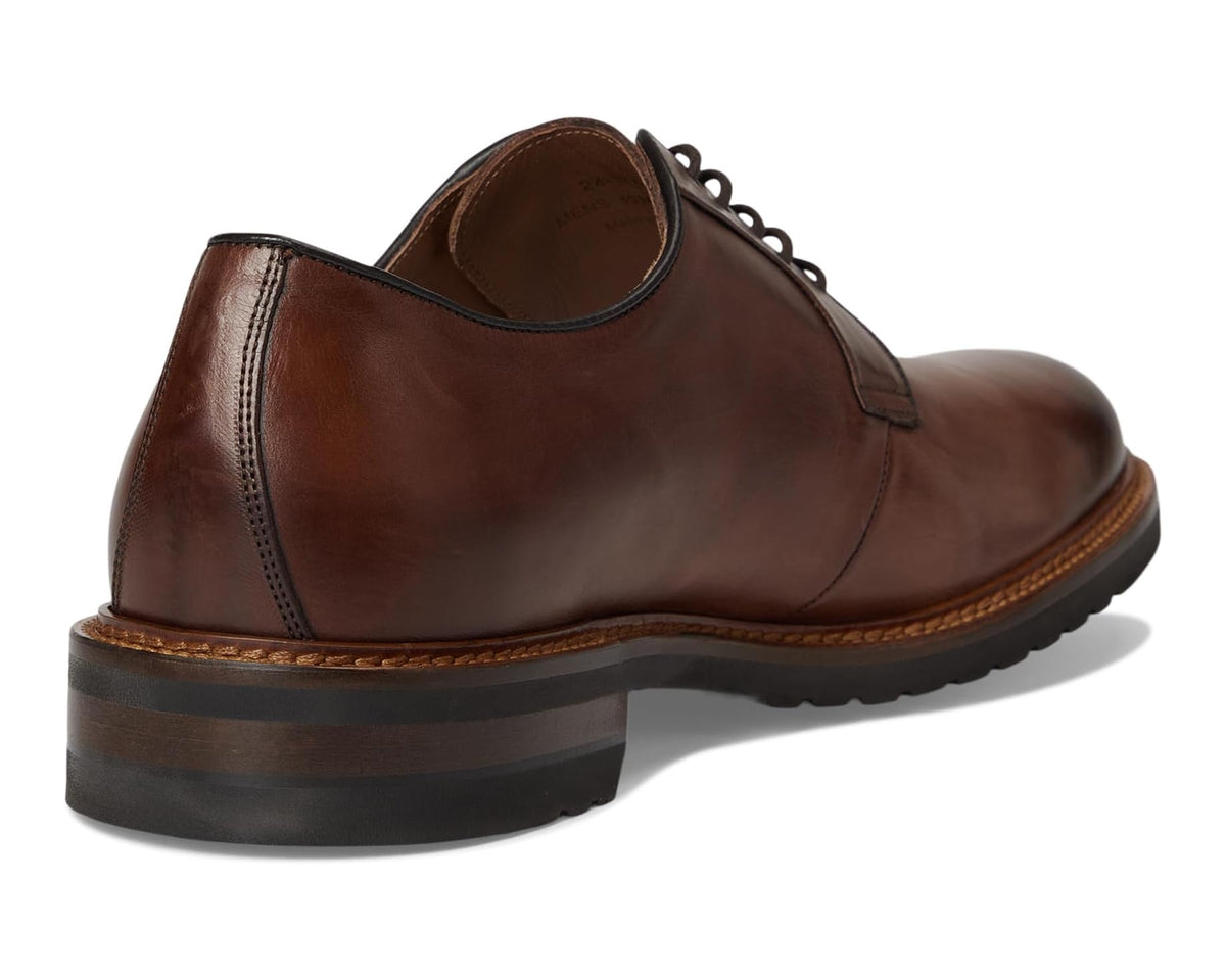 Men's tan leather oxford shoe heel and collar, lace-up design with stitched welt