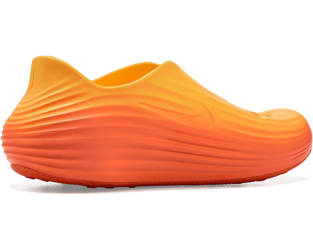 Men's Nike Reactx Rejuven8 clog-style slip-on in orange with ribbed midsole