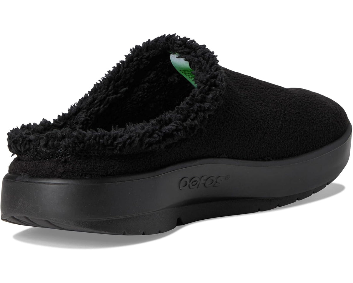 Black men's mule with fuzzy lining, rear opening, and textured outsole